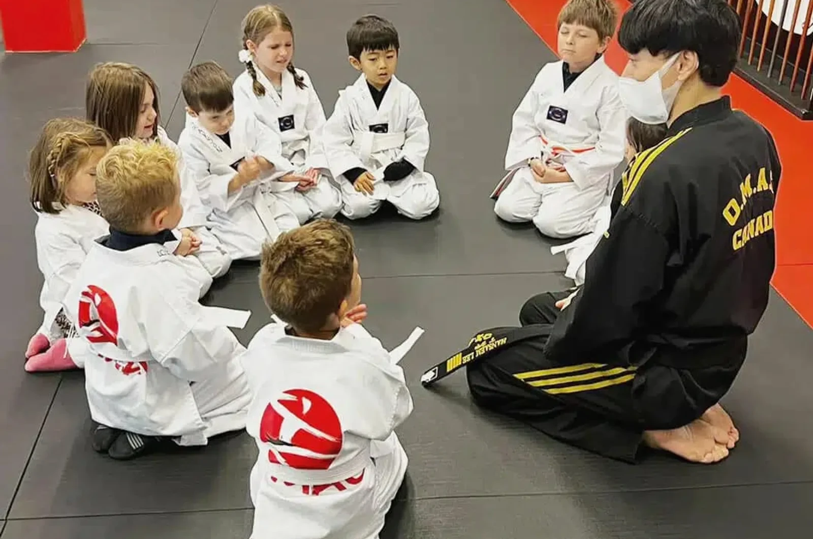 Kids learning discipline through martial arts