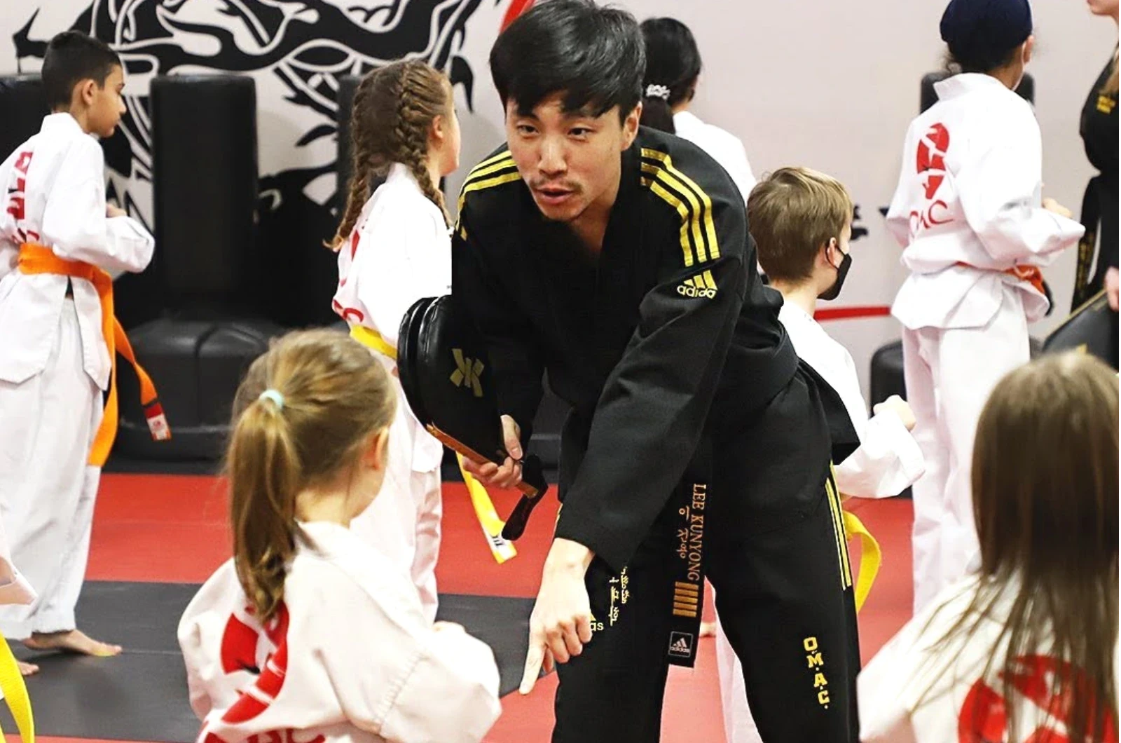 Kids learning patience through martial arts