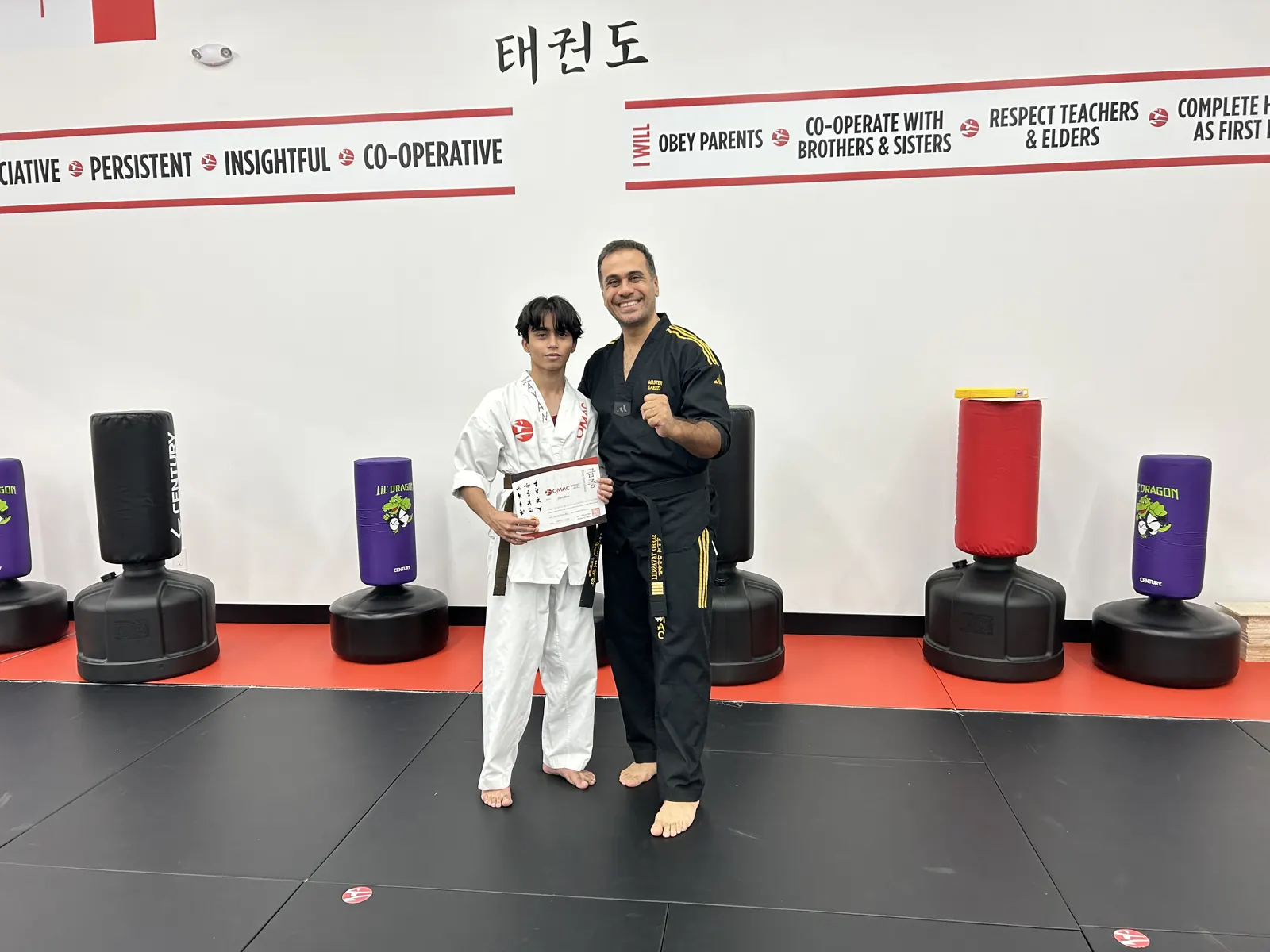 A student receiving a new belt